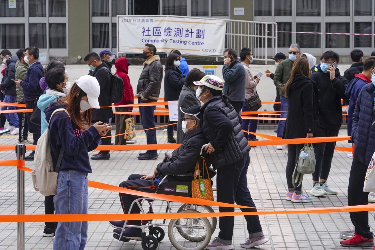 People wait for Covid-19 tests at a mobile testing station at Lek Yuen Community Hall. Photo: Felix Wong