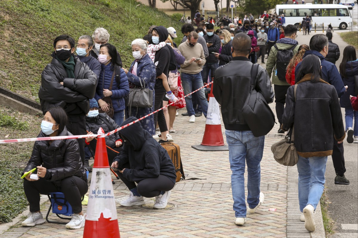 Residents queue up to receive a Covid-19 test at a mobile testing station in Discovery Bay. Photo: Yik Yeung-man