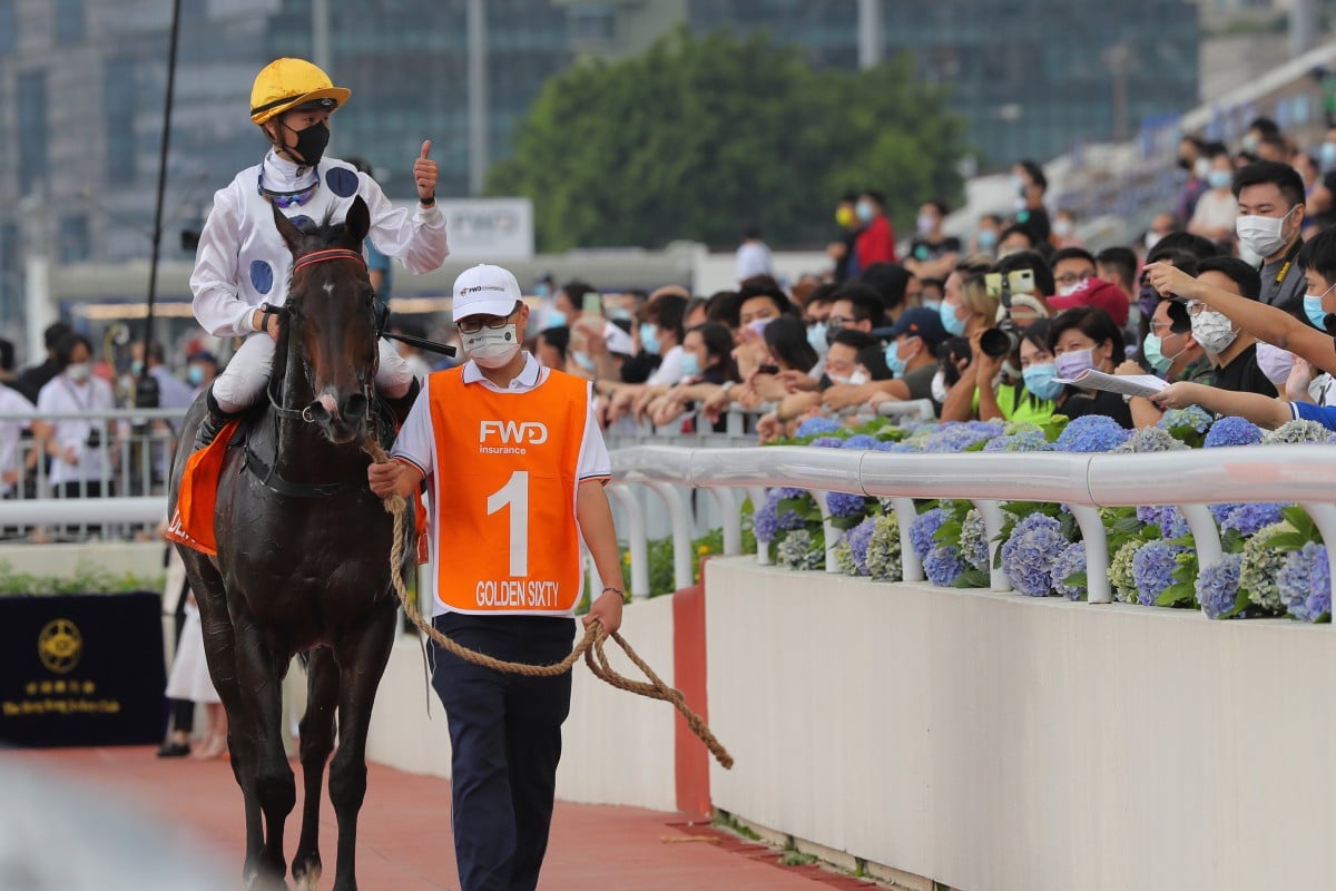 Vincent Ho acknowledges the crowd after Golden Sixty’s win in the Champions Mile last year. Photos: Kenneth Chan