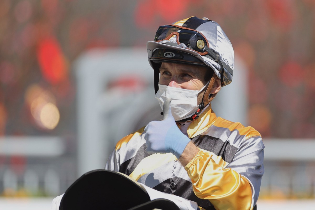 Luke Currie celebrates after winning aboard Miracle Victory on his first ride in Hong kong. Photo: HKJC