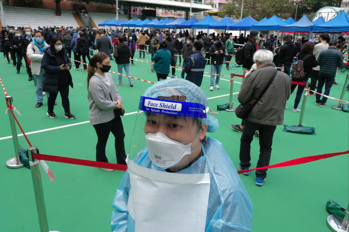 Hong Kong residents wait to get tested for the coronavirus at a temporary testing centre in February. Photo: AP