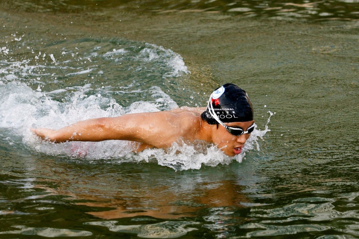 Competitive swimmer Jody Lee, 15, practices at Repulse Bay; the aspiring teen Olympian has been training in the ocean since January. Photo: Reuters