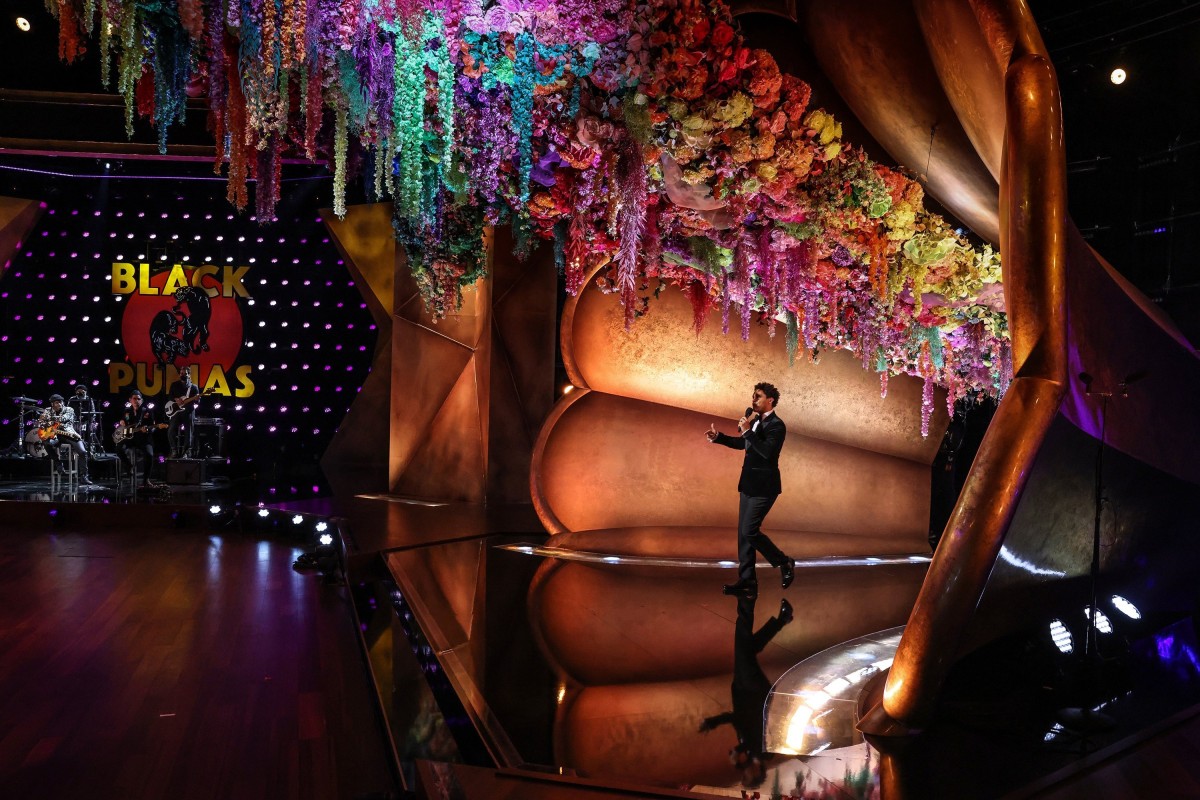 Trevor Noah will host the Grammys, which will air on Monday morning in Hong Kong, for the second year in a row. Noah is pictured here during a pre-taped segment for the 2021 awards. Photo: TNS