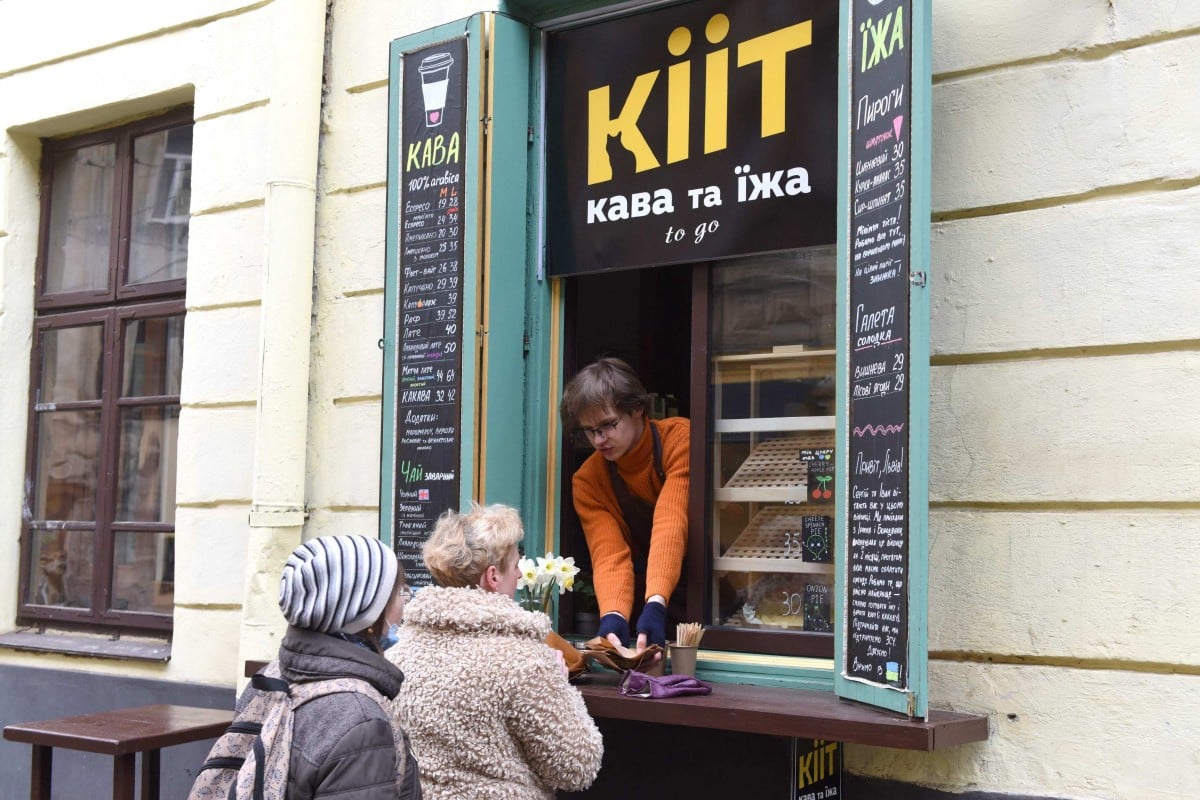Ivan Demchenko and friends opened the Kiit cafe earlier this month in Lviv. Photo: AFP