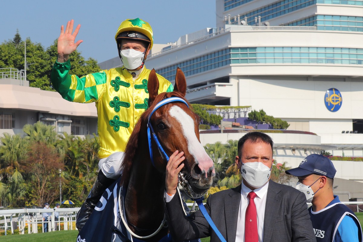 Caspar Fownes and Blake Shinn celebrate the Group One victory of Sky Field in the Hong Kong sprint. Photo: Kenneth Chan