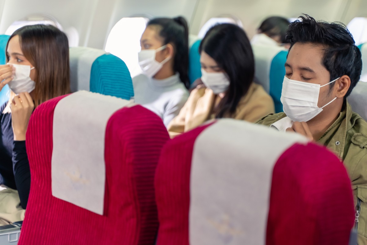 While air passengers in the United States are no longer required to wear a mask, public health experts say they still provide an additional layer of protection on planes. Photo: Shutterstock