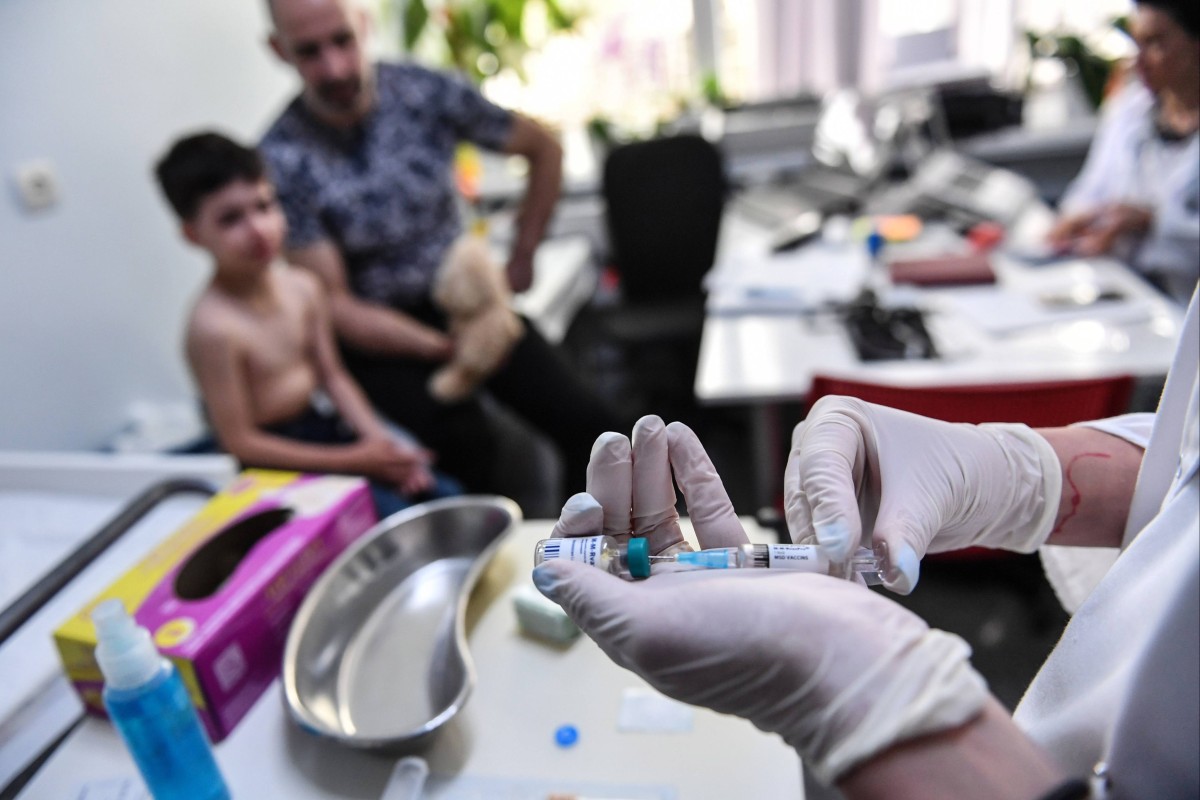 A family physician prepares a measles vaccine during a consultation in the Romanian capital of Bucharest in 2018. The coronavirus pandemic has interrupted vaccination campaigns for other childhood diseases, such as measles, leading to an increase in cases. Photo: Daniel Mihailescu/AFP via Getty Images