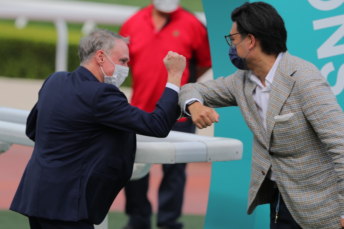 Trainer Paul O’Sullivan (left) celebrates Reve Parisien’s win with connections. Photo: Kenneth Chan 