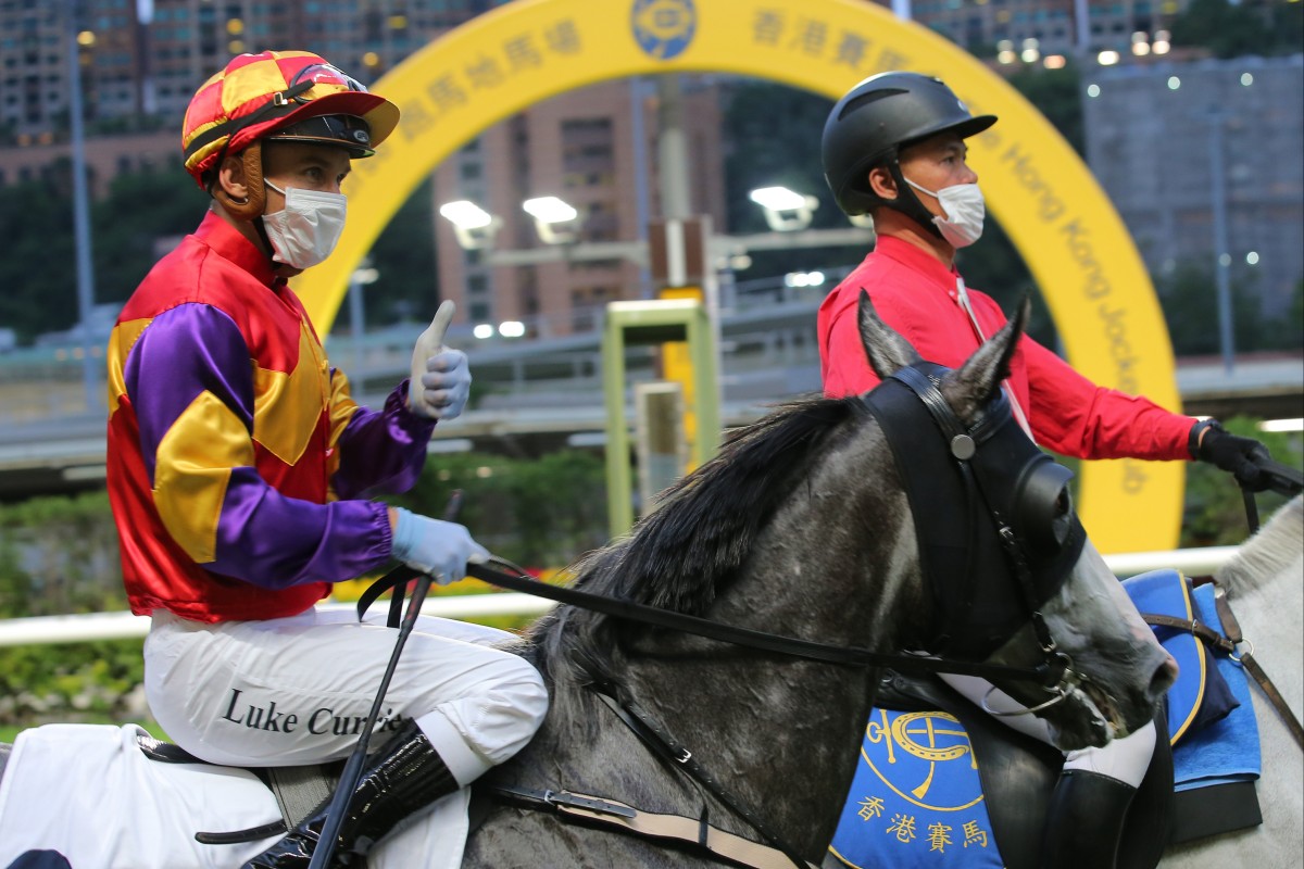 Luke Currie celebrates victory on Swot Troopers Wind at Happy Valley. Photo: Kenneth Chan