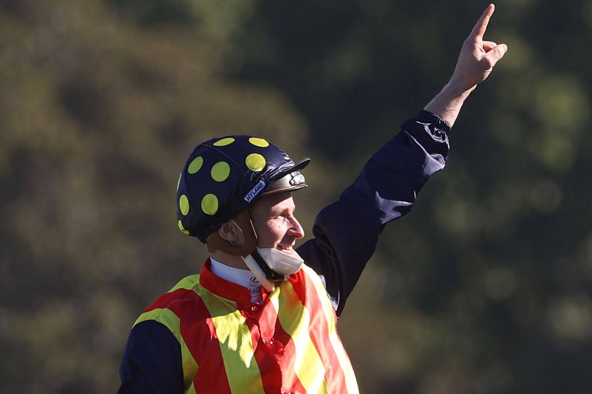 James McDonald celebrates a victory aboard Nature Strip. Photo: AFP