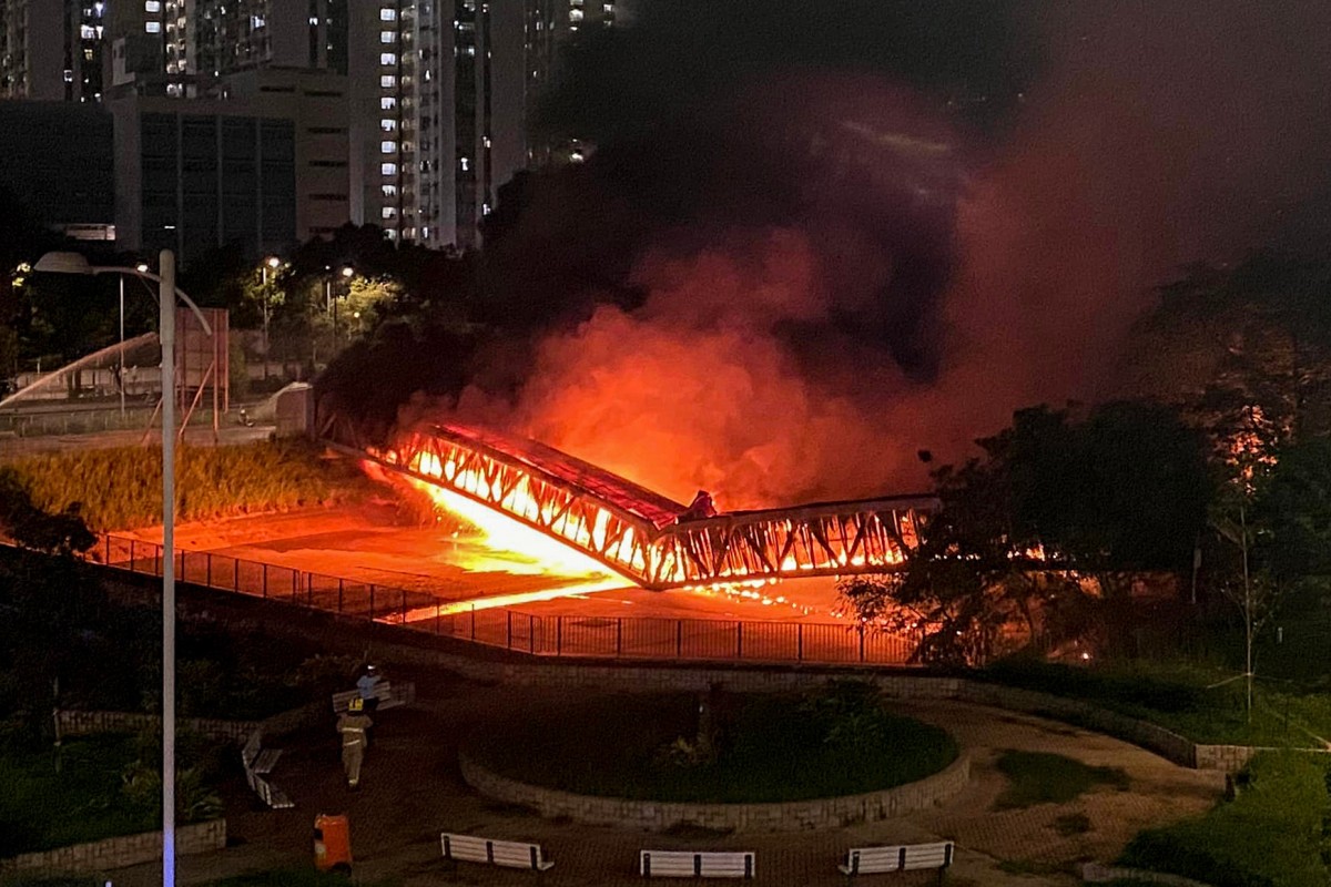 A power cable bridge located near Long Ping, Yuen Long is seen on fire on Tuesday, June 21, 2022. The event triggered a massive power outage and suspension of rail services in two other districts in Hong Kong. Photo: Facebook