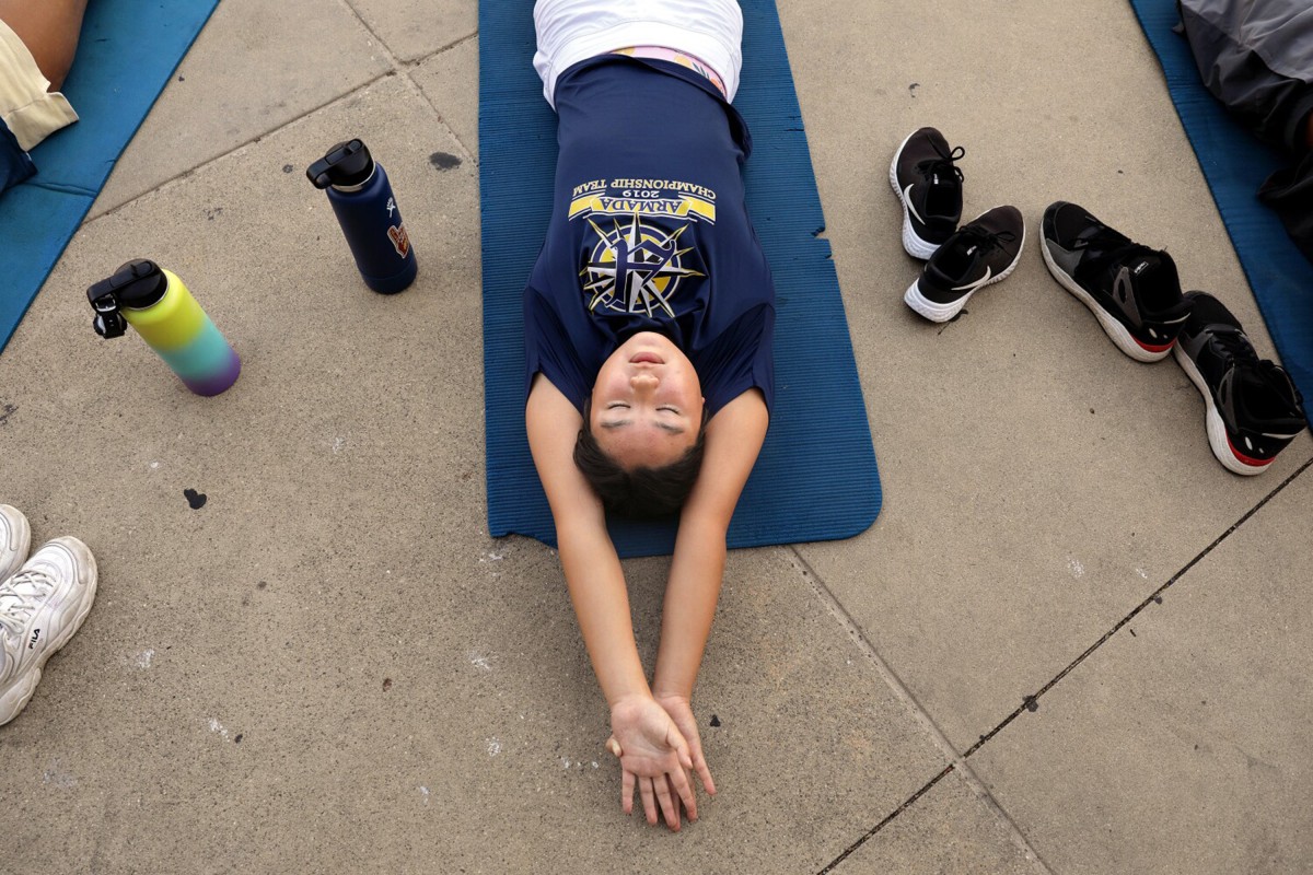 Kayla Han stretches before practice with La Mirada Armada Swim Team in the US state of California. Photo: TNS