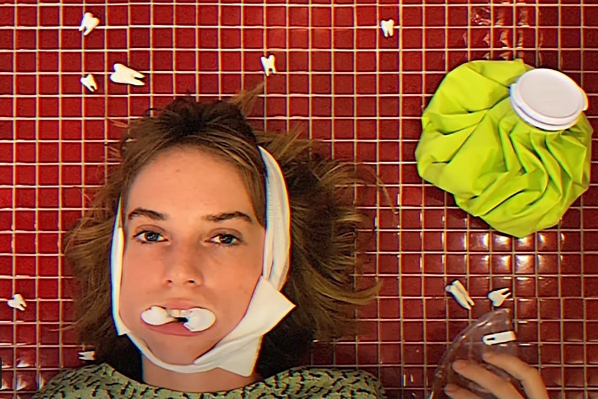 Maya Hawke heads to the dentist in the music video for her song “Sweet Tooth”. Photo: Captured from YouTube