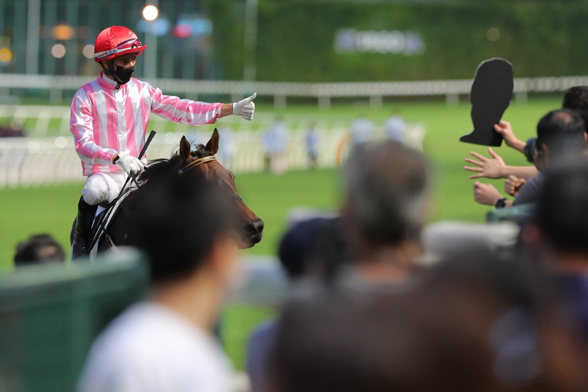 Joao Moreira salutes the Happy Valley crowd after a winner last season. Photos: Kenneth Chan