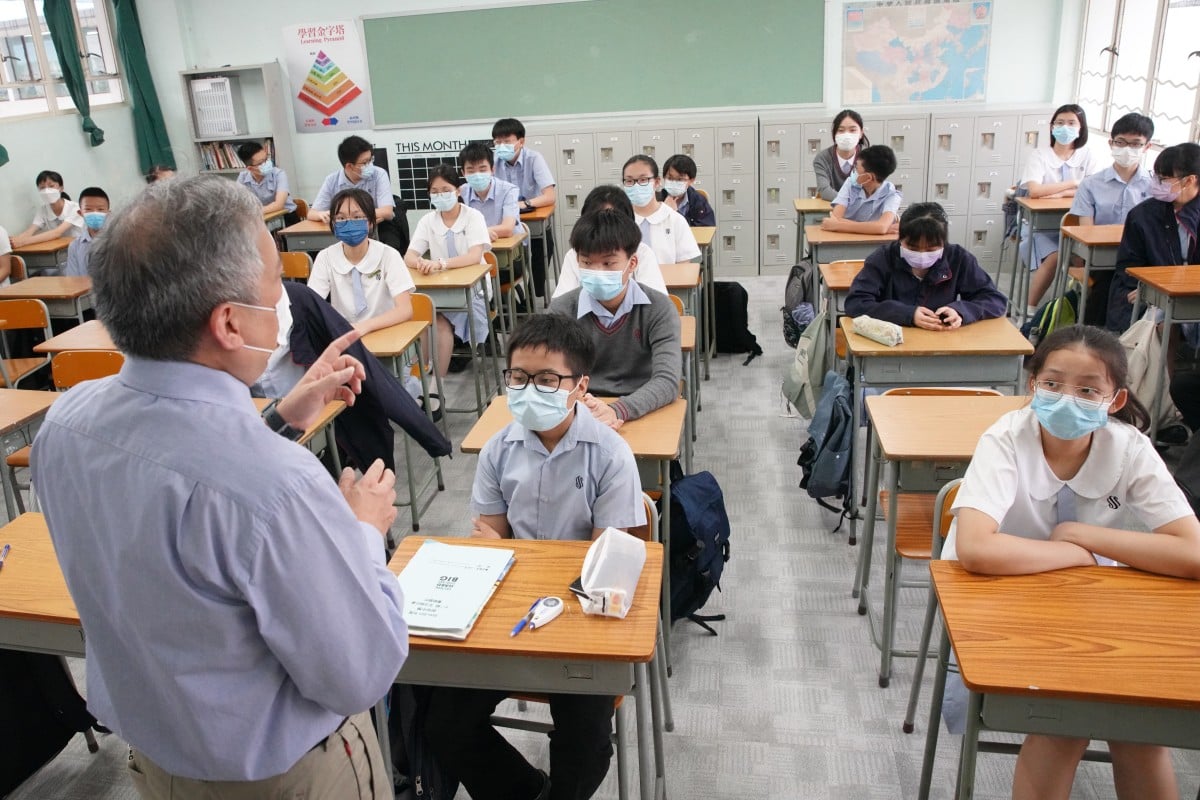 Students attend their first day of the new academic year at Scientia Secondary School, Ho Man Tin. Secondary school heads have warned that the loss of teachers is affecting students. Photo: Winson Wong