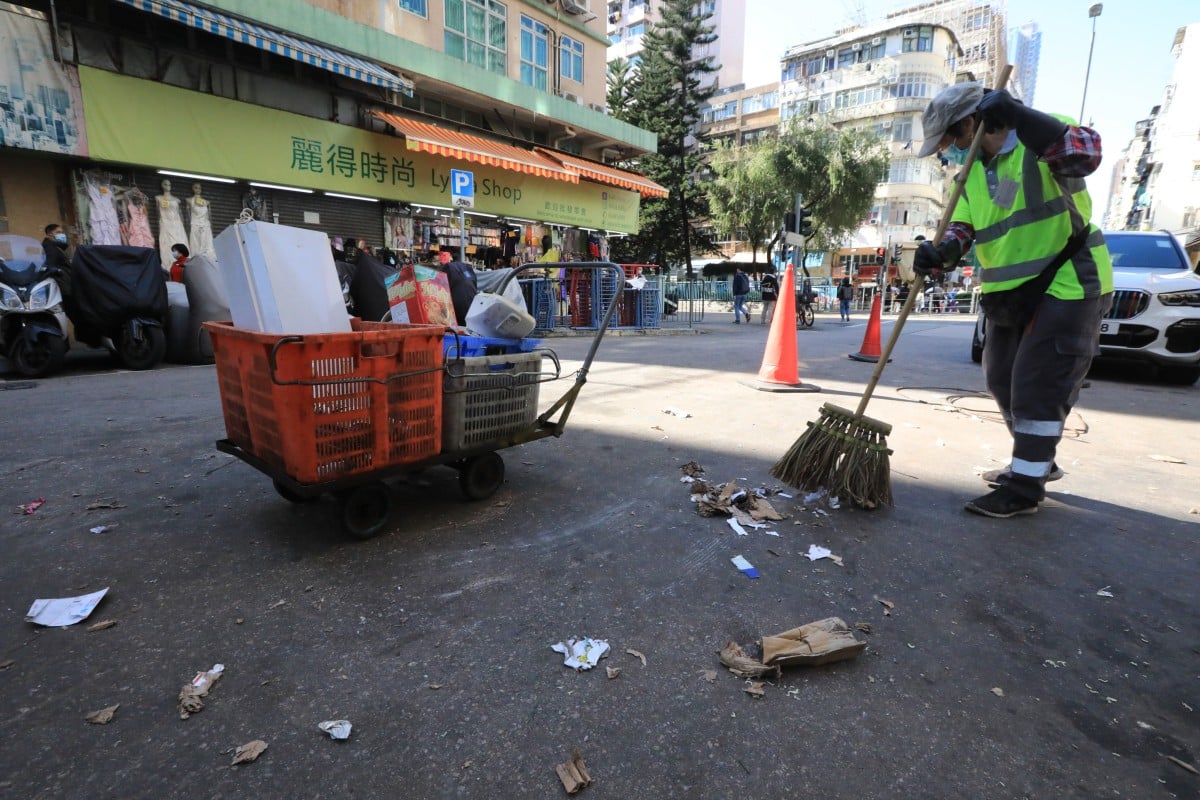 On hot days when we can choose to stay in air-conditioned rooms, street cleaners have to brave the heat. Photo: Felix Wong