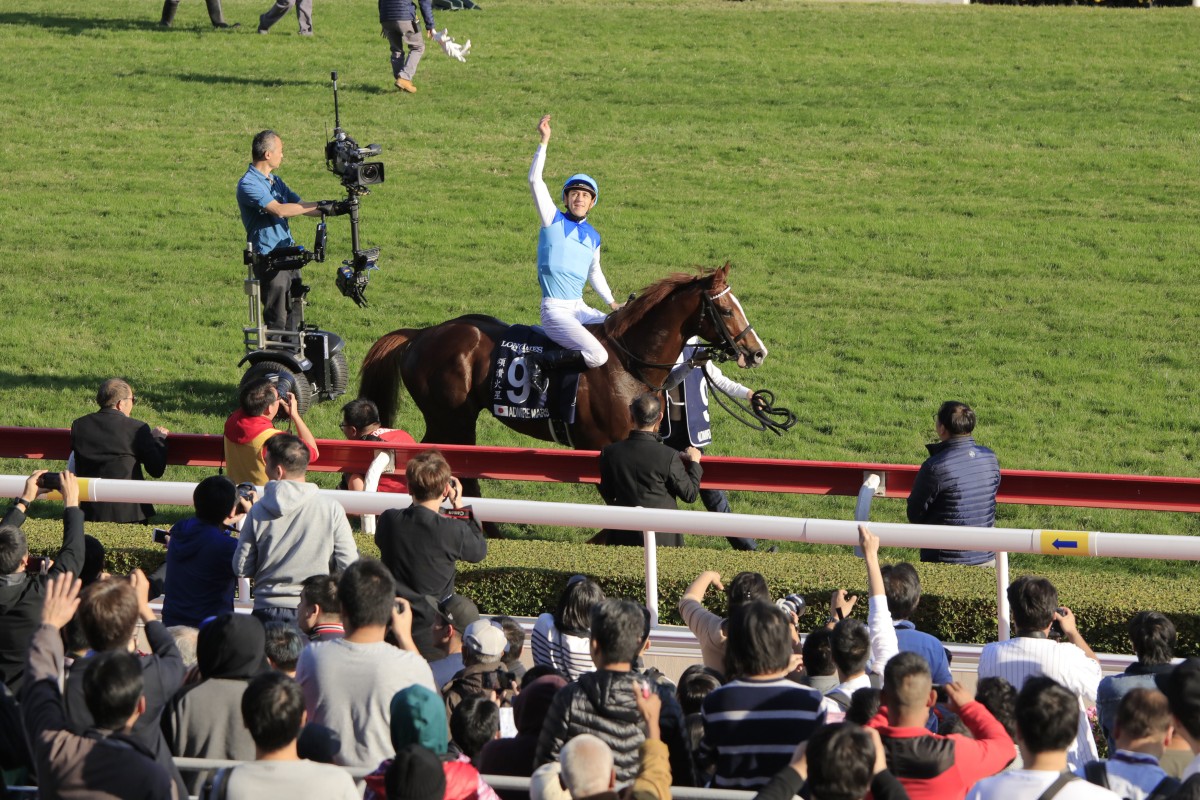 Christophe Soumillon celebrates his Hong Kong Mile win aboard Admire Mars. Photos: Kenneth Chan