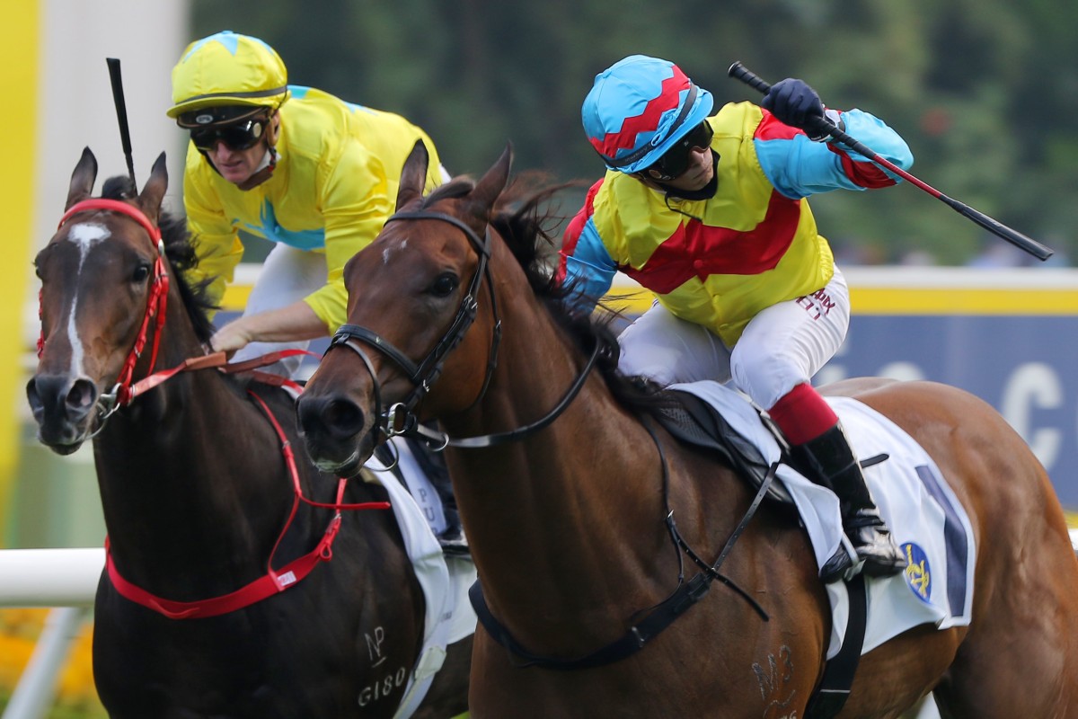 Alexis Badel punches the air with delight after riding Wellington to victory in the Group Two Premier Bowl (1,200m) at Sha Tin. Photos: Kenneth Chan