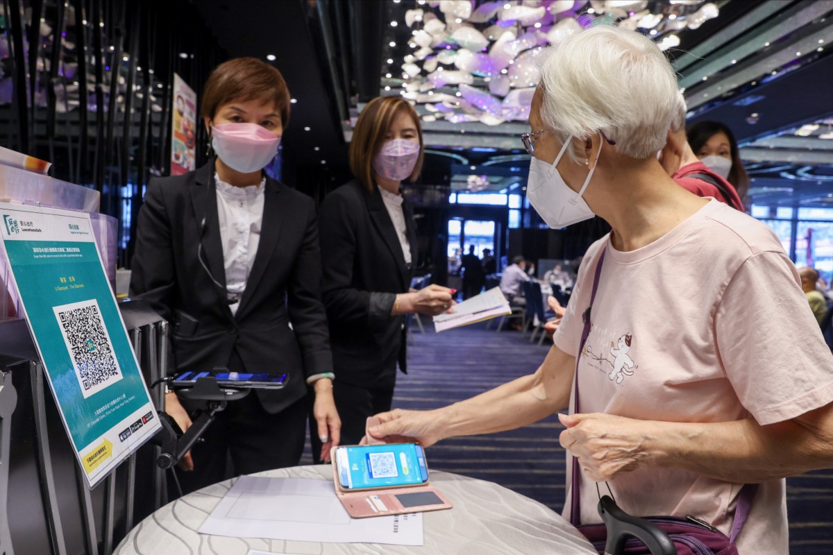 The Hong Kong government has argued that the health code system is a necessary defence as the city reduces the number of quarantine days for incoming international travellers. Photo: Edmond So