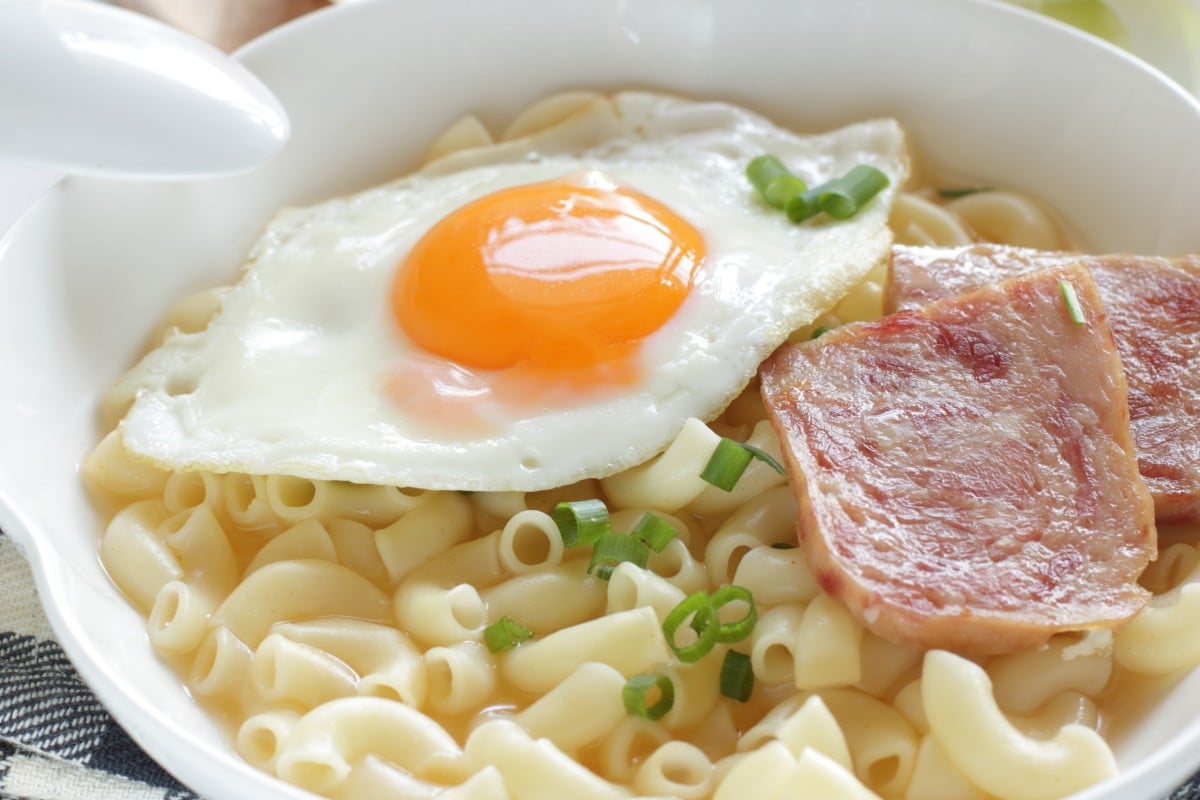 Macaroni soup topped with fried egg and luncheon meat is a popular breakfast food served in Hong Kong’s cha chaan teng. Photo: Shutterstock