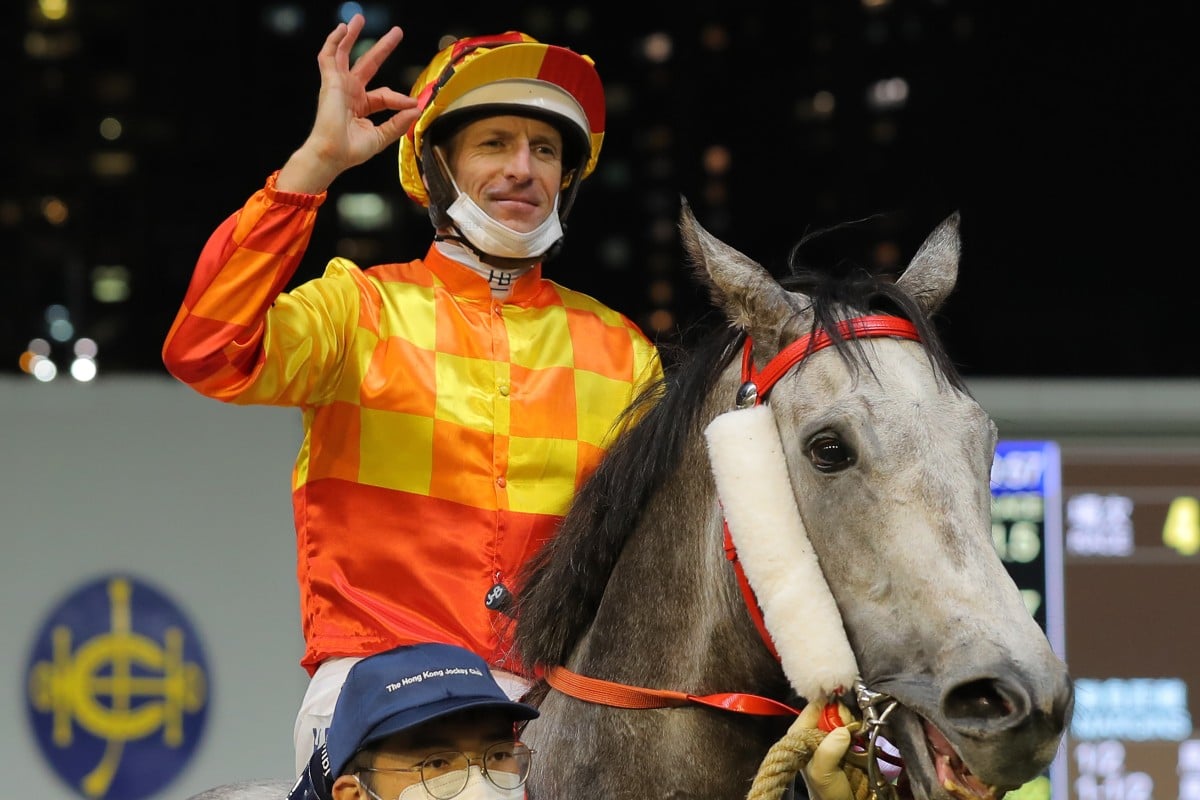 Hugh Bowman celebrates his Wednesday night win aboard Flying Silver. Photos: Kenneth Chan