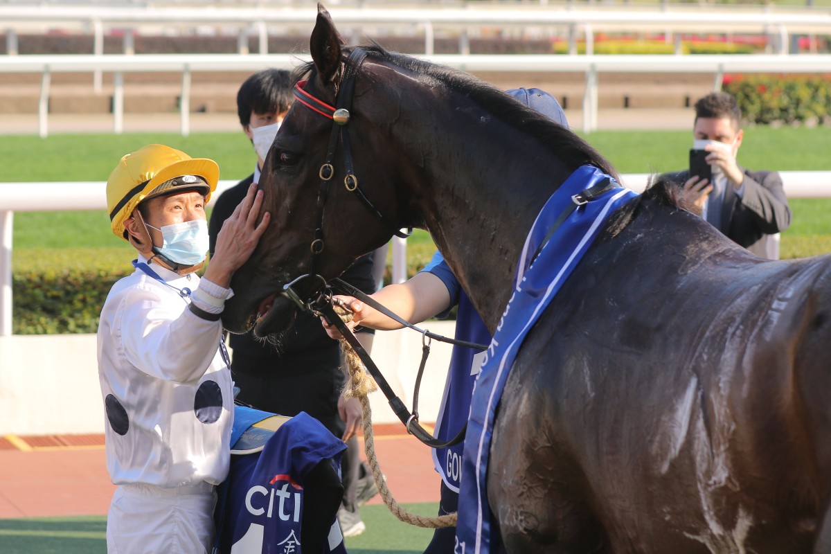 Jockey Vincent Ho gives Golden Sixty a pat after their victory in the 2021 Gold Cup. Photos: Kenneth Chan