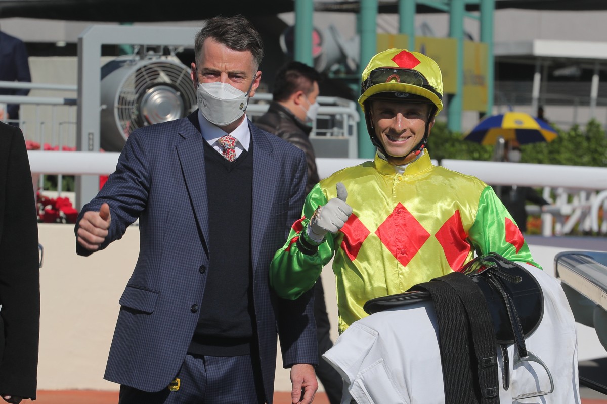 Trainer Jamie Richards and jockey Lyle Hewitson celebrate Holy Power’s win at Sha Tin on Sunday. Photo: Kenneth Chan