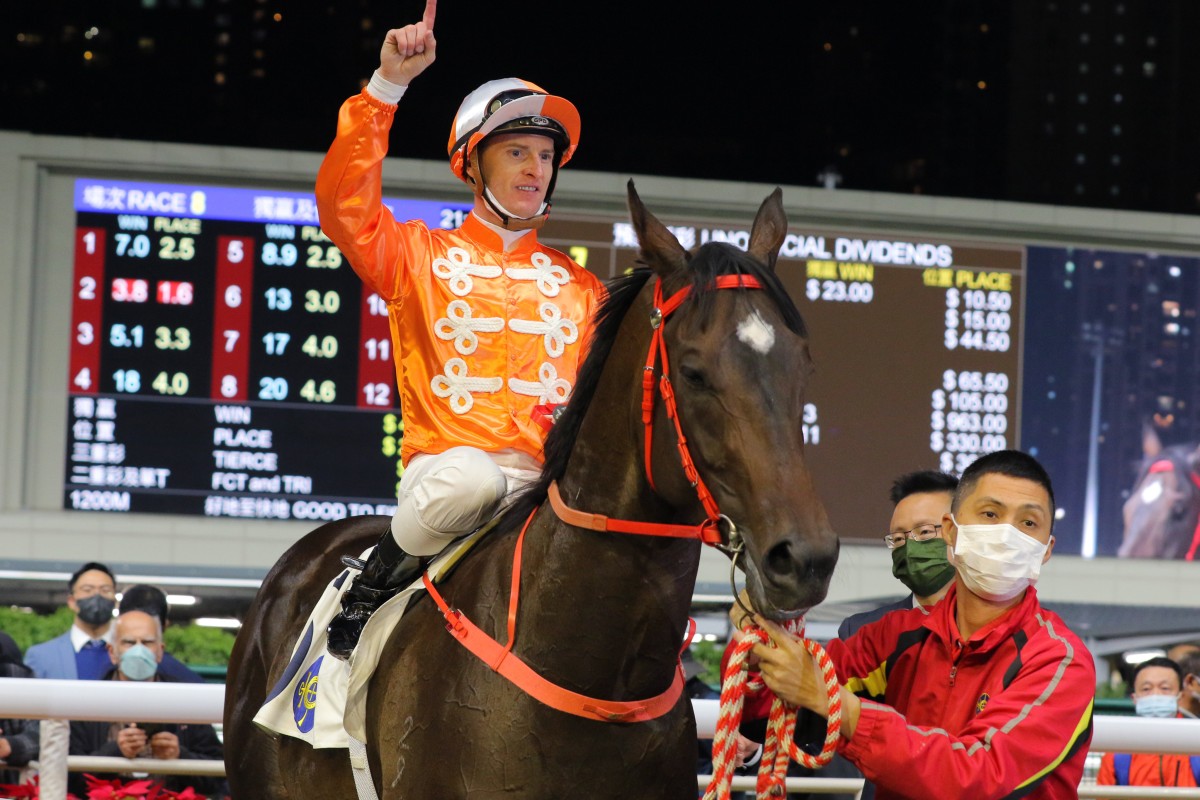 Zac Purton celebrates his 1,498th Hong Kong win aboard Howdeepisyourlove at Happy Valley on Wednesday night. Photo: Kenneth Chan