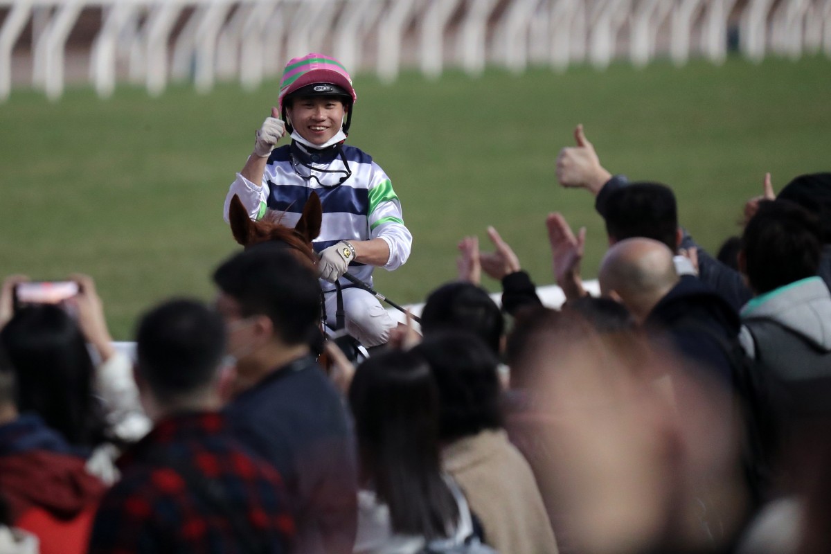 Dylan Mo enjoys the winning feeling after Packing Treadmill’s Class Two Poinsettia Handicap (1,600m) victory at Sha Tin on Saturday. Photo: Kenneth Chan