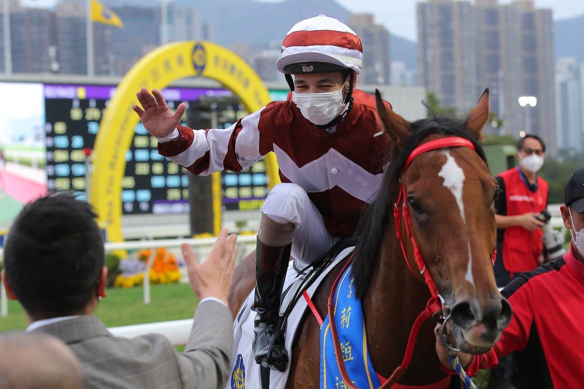 A beaming Vagner Borges dishes out high fives after winning aboard Sight Success at Sha Tin on Sunday. Photos: Kenneth Chan