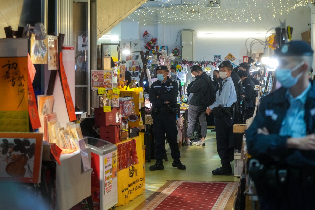 Hong Kong police have arrested six members of an “anti-government organisation” for alleged sedition for producing and selling a book about the 2019 protests at a Lunar New Year fair. Photo: Sam Tsang