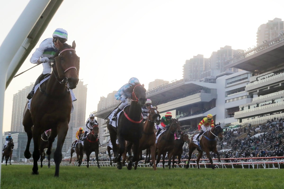 Voyage Bubble (left) beats Tuchel and Packing Treadmill to win the Classic Mile. Photo: Kenneth Chan