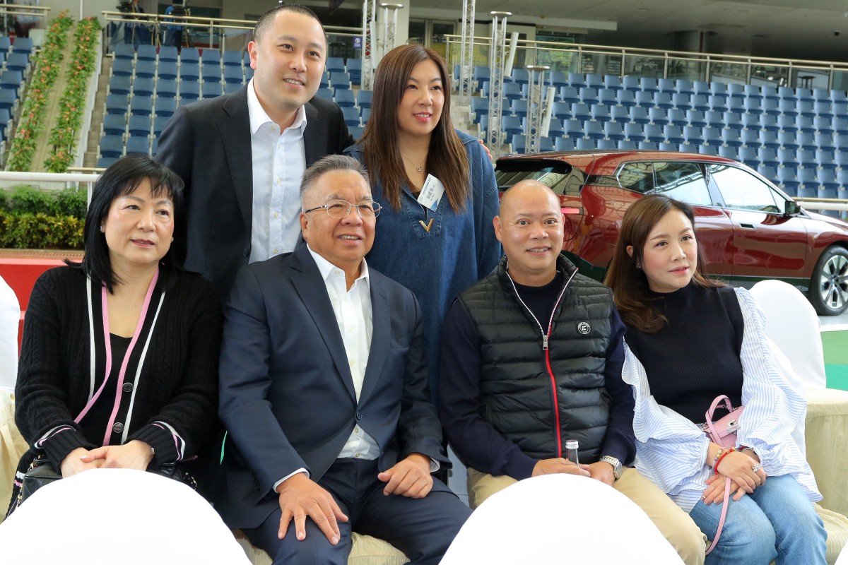 The Wong family - with Janice back right and Matthew second from left at the front - and trainer Chris So (second from right at the front) at the Hong Kong Derby barrier draw. Photos: Kenneth Chan