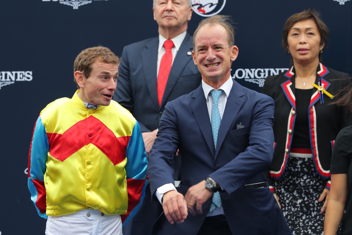 Jockey Ryan Moore and trainer Richard Gibson celebrate Wellington’s victory in the 2022 Hong Kong Sprint. Photo: Kenneth Chan