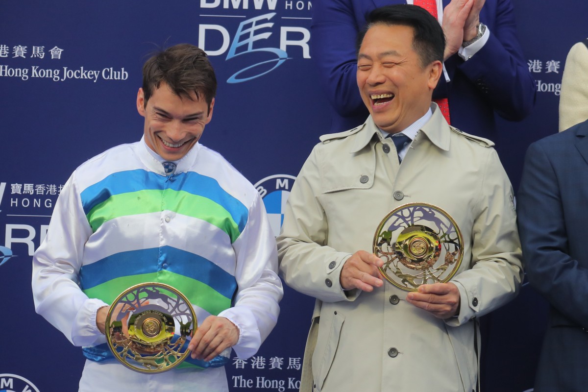 Jockey Alexis Badel and trainer Ricky Yiu lap up Voyage Bubble’s victory in the Hong Kong Derby. Photos: Kenneth Chan