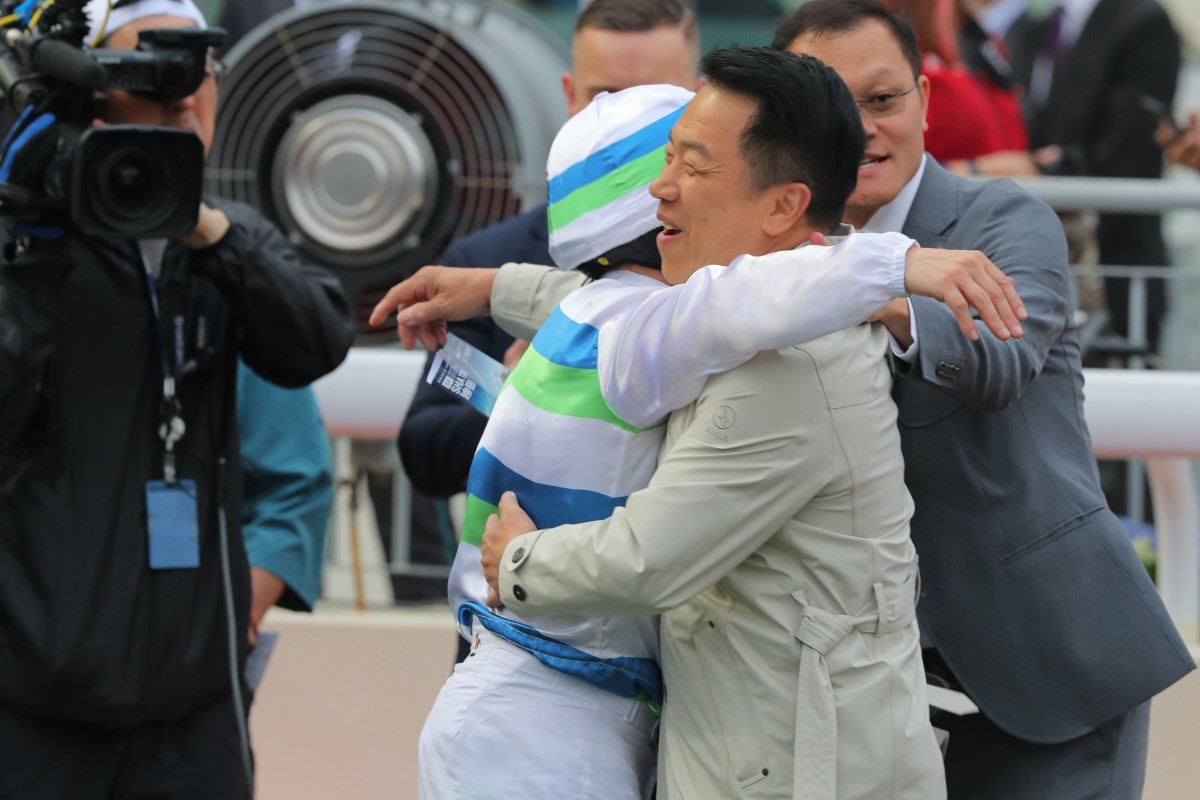 Ricky Yiu hugs jockey Alexis Badel after their Derby success. Photos: Kenneth Chan