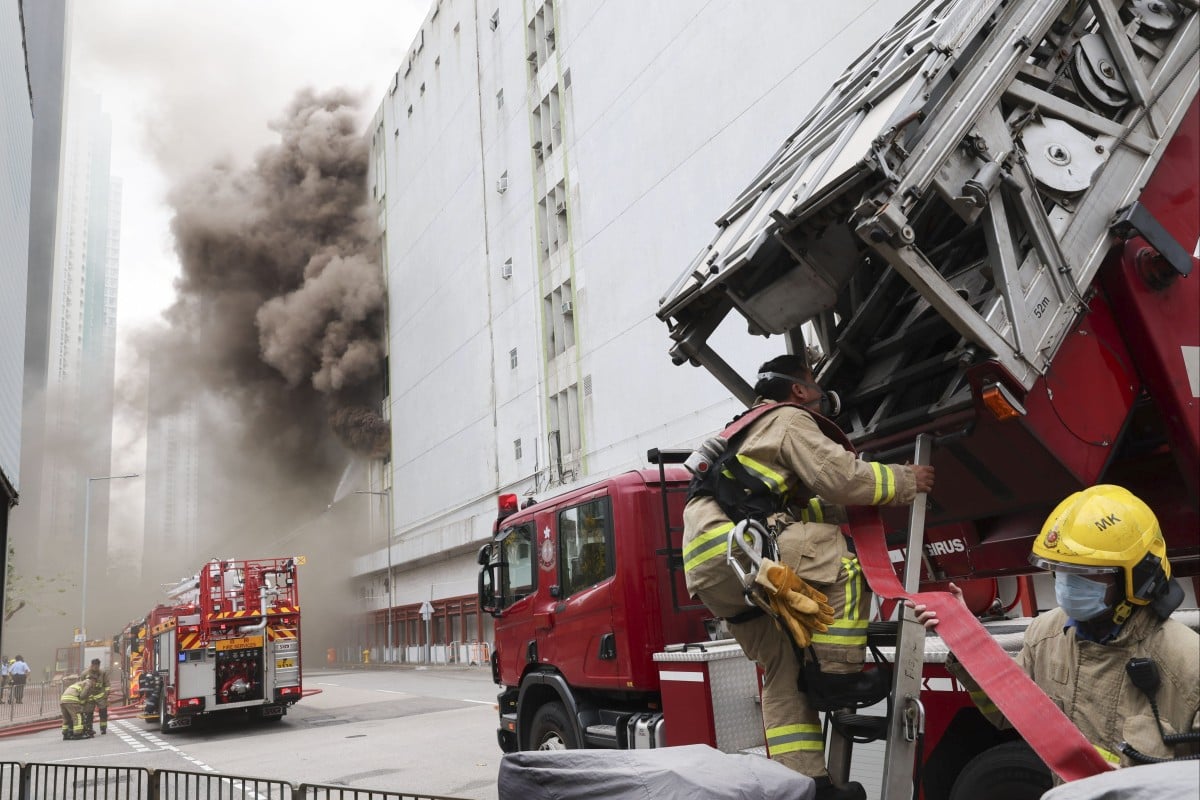 Hong Kong firefighters are battling a No 3 alarm blaze at a warehouse in Cheung Sha Wan which has left six people injured. Photo: Yik Yeung-man