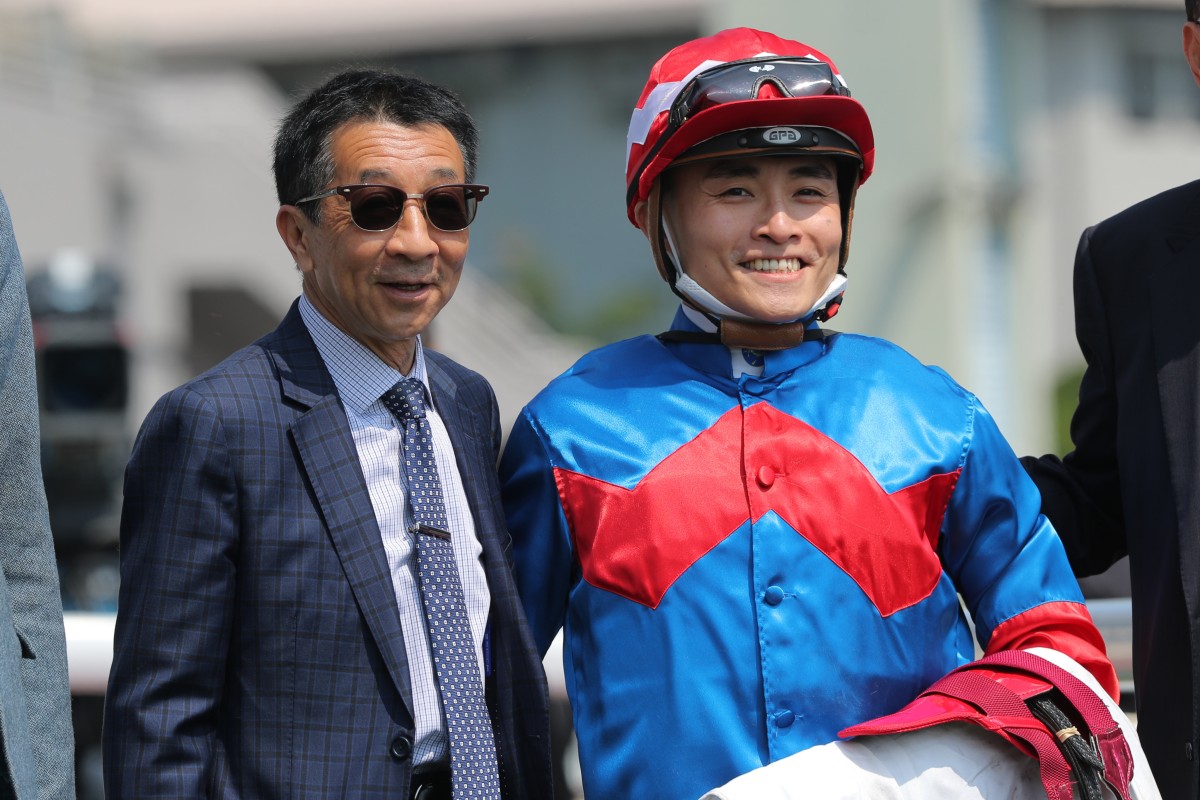 Trainer Me Tsui and jockey Keith Yeung celebrate Fortune President’s recent win. Photo: Kenneth Chan
