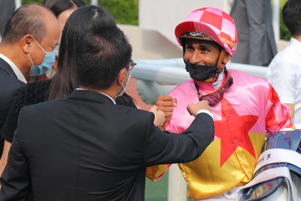 Karis Teetan celebrates Amazing Victory’s win at Sha Tin on September 11 with connections. Photo: Kenneth Chan