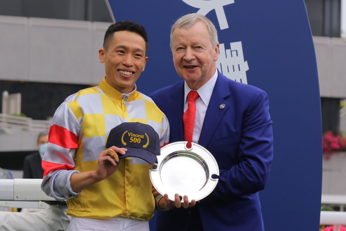 Jockey Club chief executive Winfried Engelbrecht-Bresges congratulates Vincent Ho on riding his 500th winner in Hong Kong. Photo: Kenneth Chan