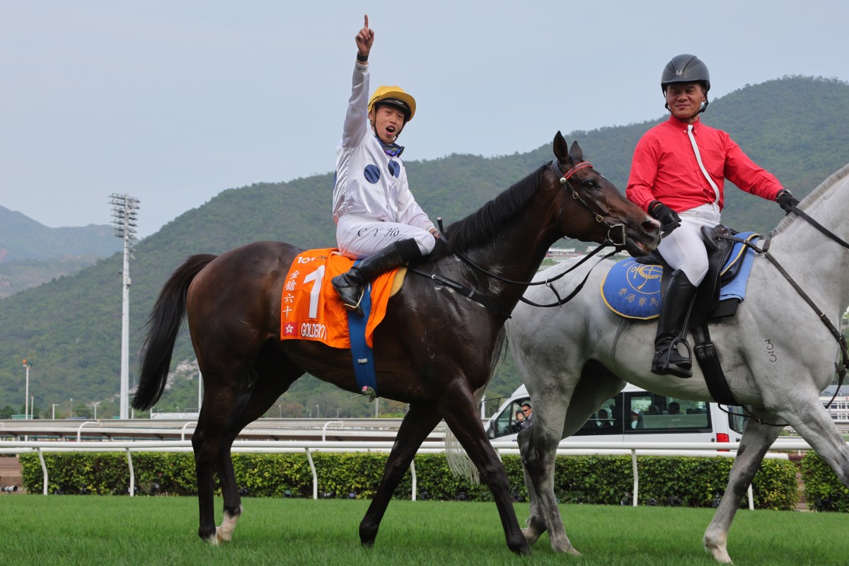 An ecstatic Vincent Ho celebrates Golden Sixty’s victory in the Champions Mile at Sha Tin on Sunday. Photos: Kenneth Chan