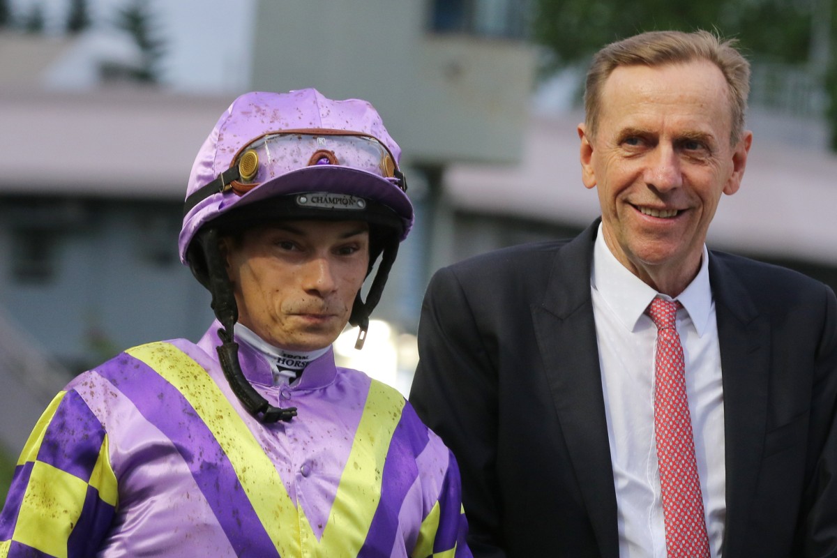 Jockey Alexis Badel and trainer John Size celebrate Seizing The Moment’s win at Sha Tin on Sunday. Photo: Kenneth Chan