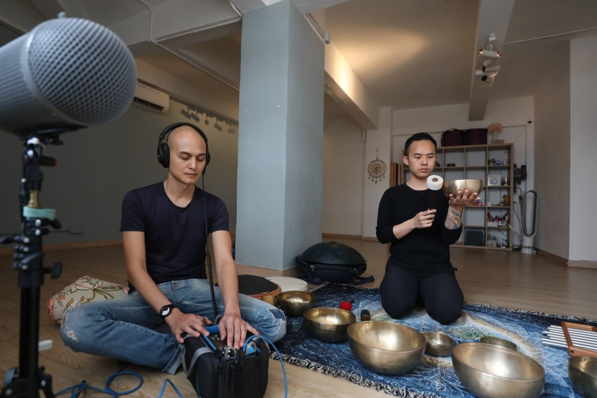 Sound recordist Terence Lloren (left) and sound bath practitioner Calvin Chan record the deep vibrations created by instruments such as singing bowls. Photo: Xiaomei Chen