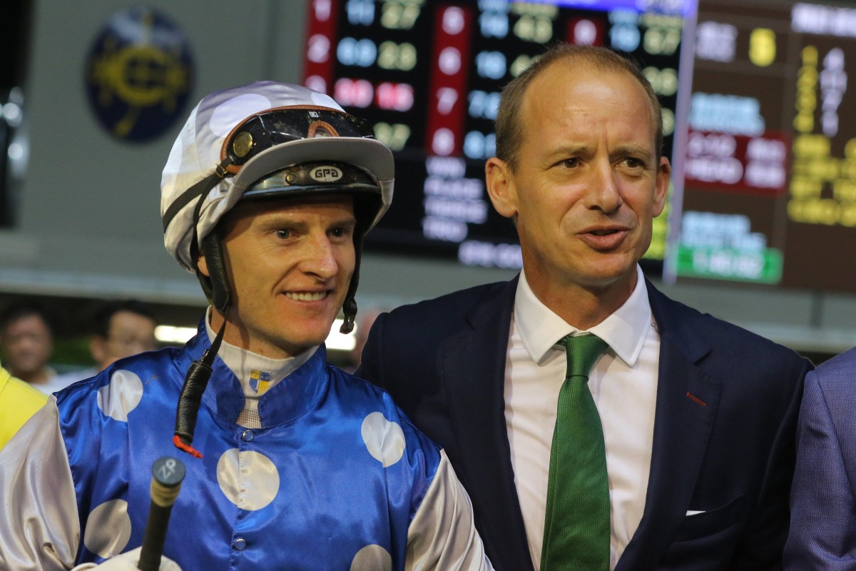 Jockey Zac Purton and trainer Richard Gibson celebrate Right Honourable’s win at Happy Valley in September 2018. Photo: Kenneth Chan