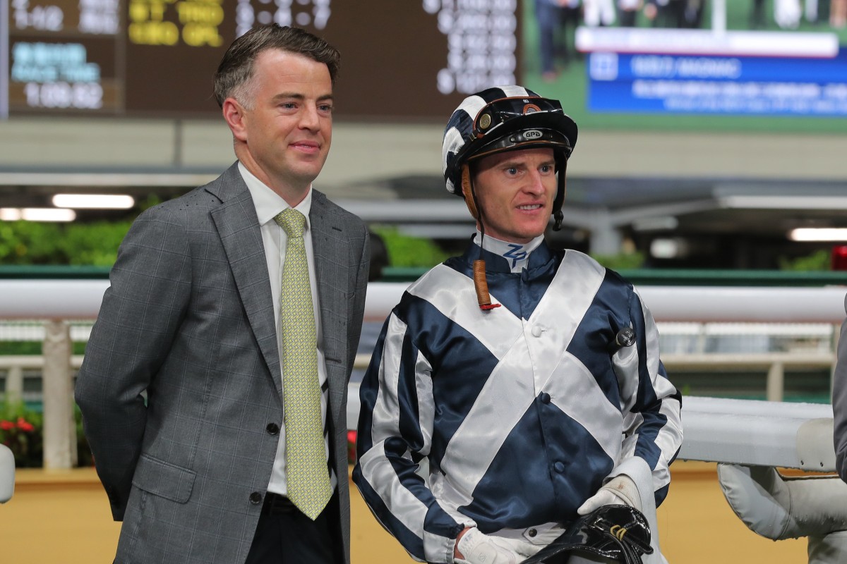 Jamie Richards and Zac Purton celebrate Australian import Magniac’s first Hong Kong win at Happy Valley on April 19. Photo: Kenneth Chan