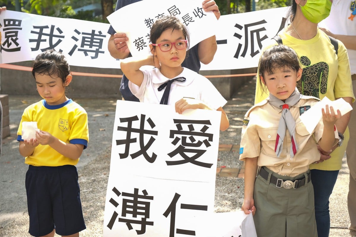 About a dozen parents and students from Po Yan Oblate Primary School last month appealed to the city’s education minister not to axe Primary One classes at the school. Photo: SCMPOST