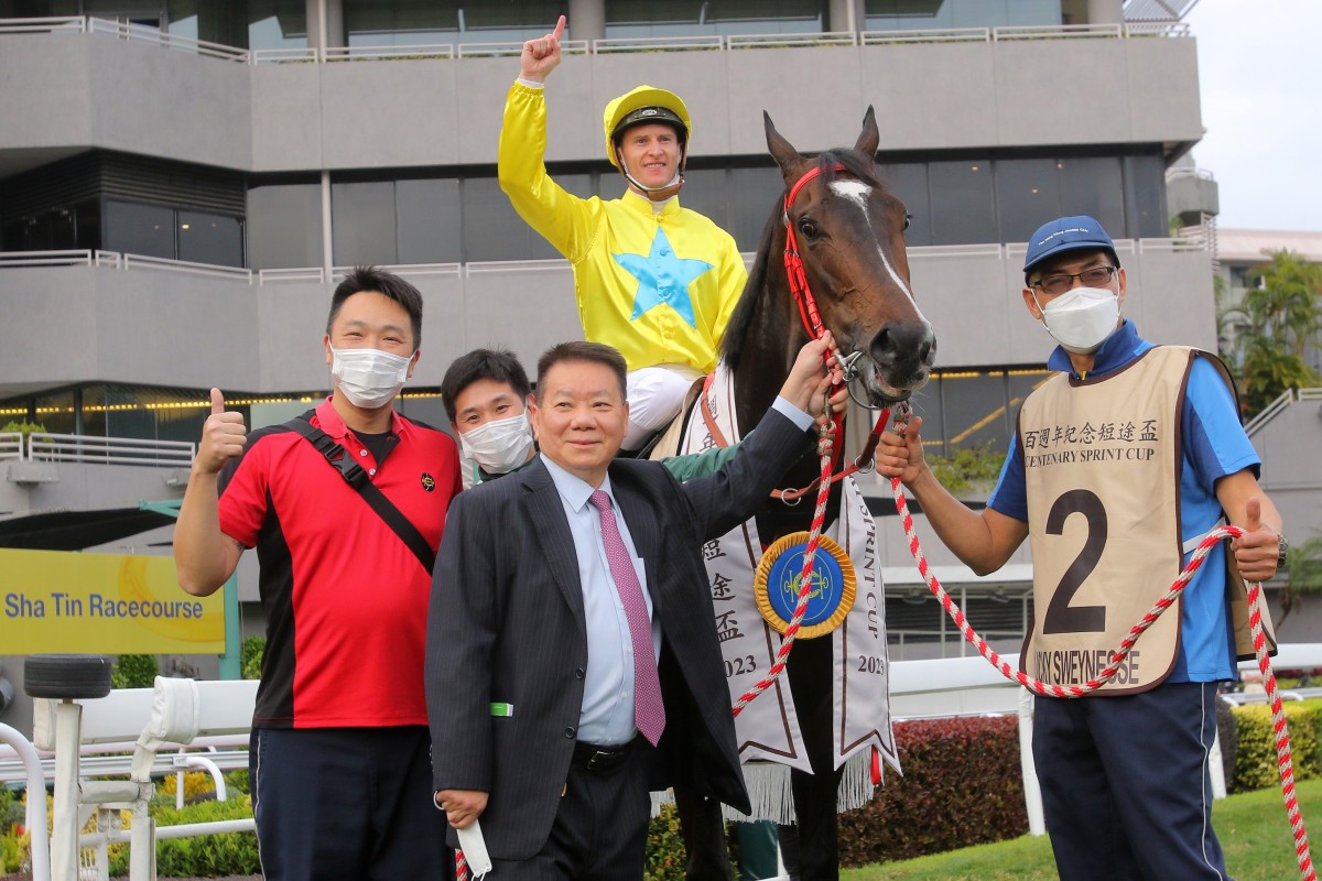 Manfred Man, Zac Purton and stable staff celebrate Lucky Sweynesse’s Group One Centenary Sprint Cup (1,200m) win at Sha Tin on February 5. Photo: Kenneth Chan