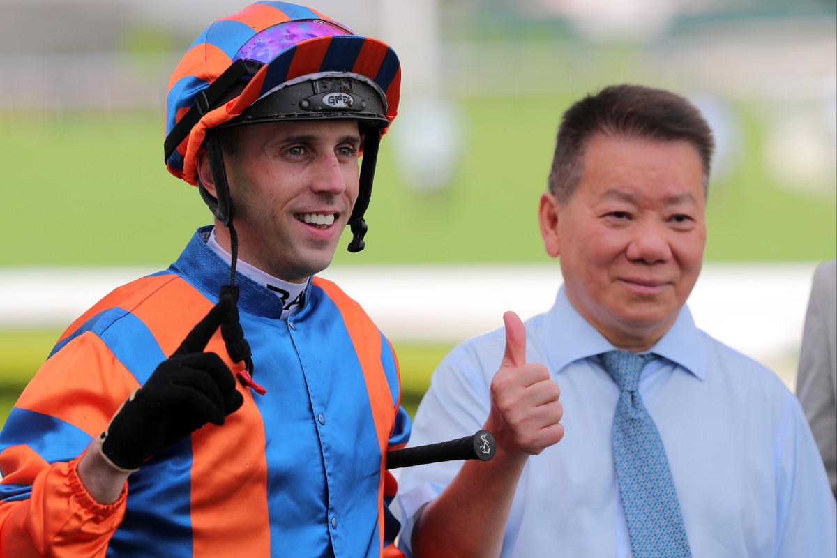 Brenton Avdulla celebrates his first Hong Kong win with Go Go Sixteen’s trainer, Manfred Man. Photos: Kenneth Chan