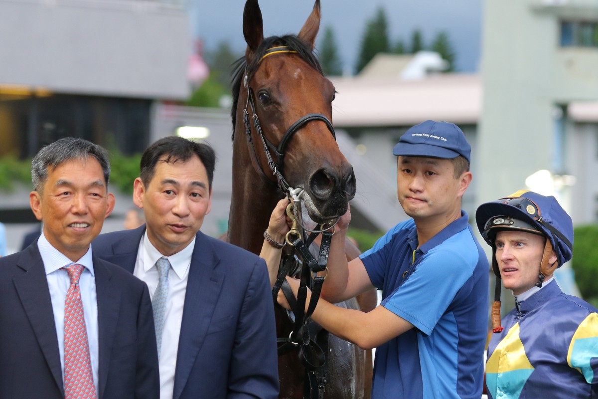 Trainer Michael Chang, rider Zac Purton and fellow connections celebrate Lady’s Choice’s win at Sha Tin on Saturday. Photos: Kenneth Chan