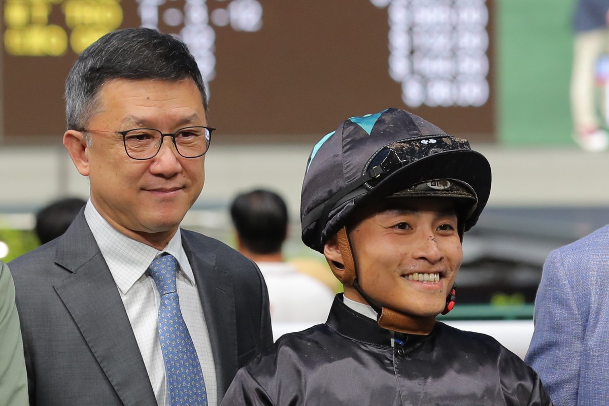 Trainer Peter Ho and jockey Keith Yeung enjoy Splendid Star’s victory. Photo: Kenneth Chan